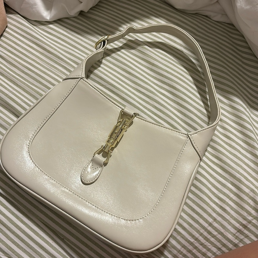 Faux Gucci Jackie- cream colored barely used
